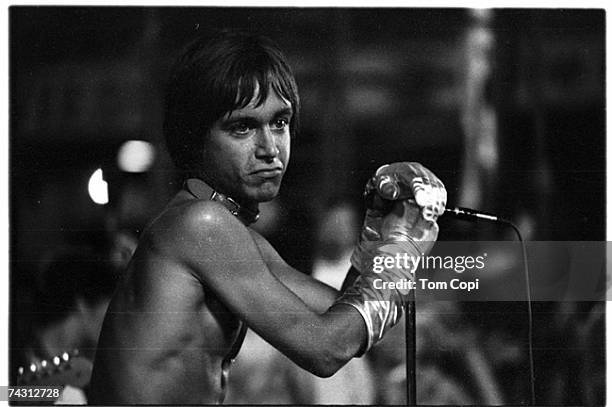 Iggy Pop wearing a dog collar on stage with The Stooges at the Cincinnati Pop Festival at Crosley Field, Cincinnati, Ohio, 13th June 1970.
