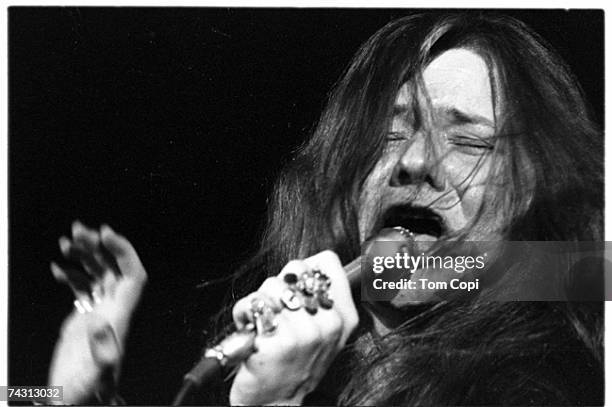 Rock singer Janis Joplin perform at the Crisler Arena at the university of Michigan on March 15, 1969 in Ann Arbor, Michigan.