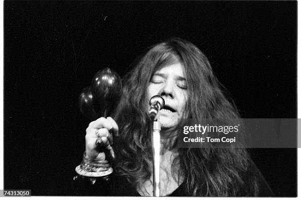 Rock singer Janis Joplin perform at the Crisler Arena at the university of Michigan on March 15, 1969 in Ann Arbor, Michigan.