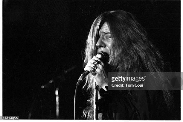 Rock singer Janis Joplin perform at the Crisler Arena at the university of Michigan on March 15, 1969 in Ann Arbor, Michigan.