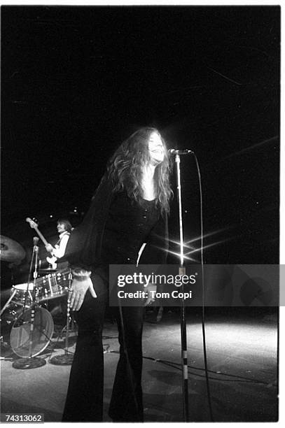 Rock singer Janis Joplin perform at the Crisler Arena at the university of Michigan on March 15, 1969 in Ann Arbor, Michigan.