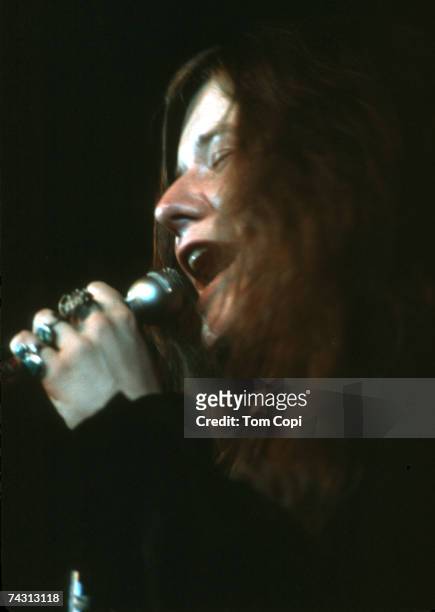 Rock singer Janis Joplin perform at the Crisler Arena at the university of Michigan on March 15, 1969 in Ann Arbor, Michigan.