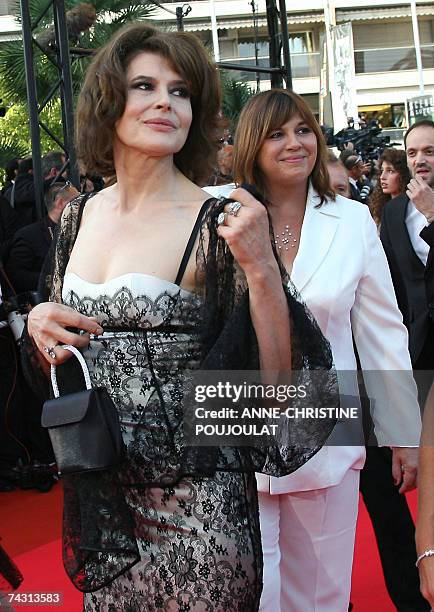 French actresses Fanny Ardant and Michele Barnier pose 24 May 2007 as they arrive at the Festival Palace in Cannes, southern France, for the premiere...