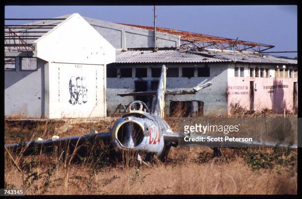 The rusting hulk of a Soviet-built MIG-17 sits on a field June 7, 1992 in Caimbambo, Angola. Angola has been engulfed in civil war and political...