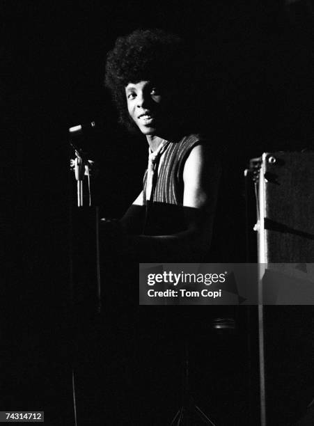 Singer Sly Stone of the psychedelic soul group 'Sly & The Family Stone' plays piano onstage in circa 1969.