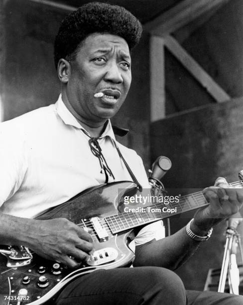 Blues Guitarist and singer Muddy Waters performs at the Ann Arbor Blues Festival in August 1969 in Ann Arbor, Michigan.
