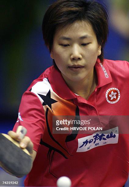 Zhang Yining of China serves to Sui Fei Lau of Hong Kong during their match on the fifth day of the World Table Tennis Championships 25 May 2007, in...