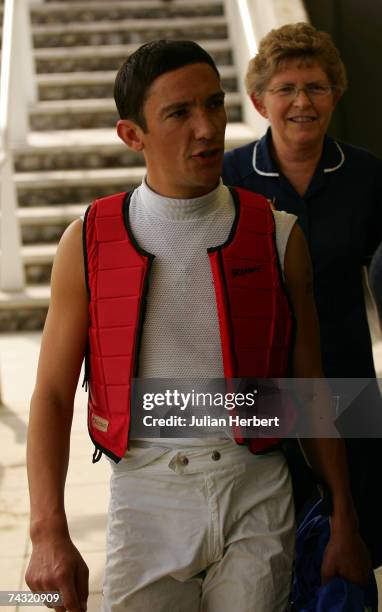 Frankie Dettori returns to the weighing room after falling from Fort Amhurst during The M-real Stakes Race run at Goodwood Racecourse on May 25 in...