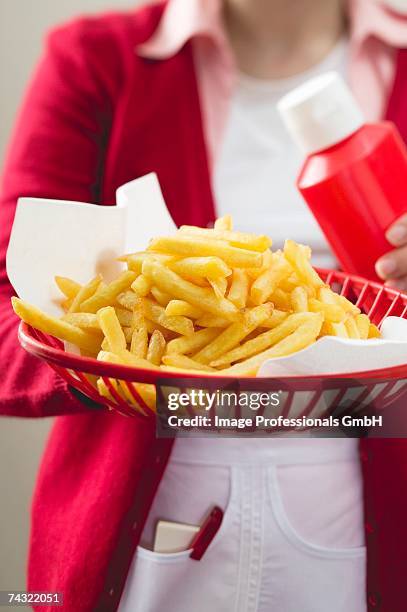 chips in plastic basket - waitress booth stock pictures, royalty-free photos & images