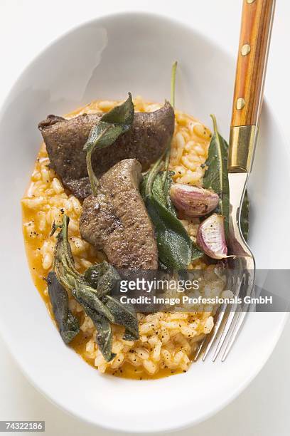 risotto with fried calf's liver, sage and garlic - beef liver stock pictures, royalty-free photos & images