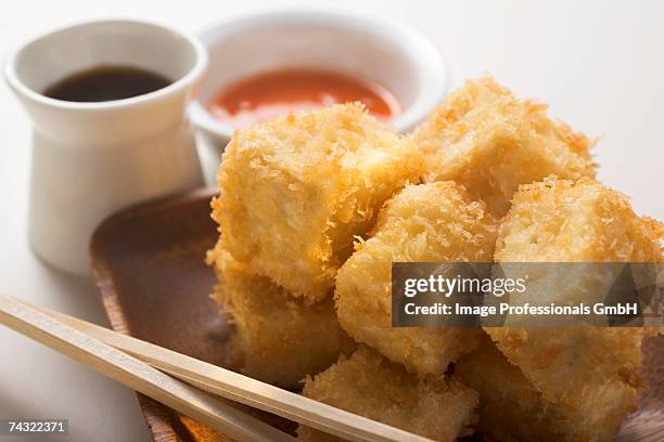 breaded tofu cubes with soy sauce (asia) - hoisin sauce stock pictures, royalty-free photos & images