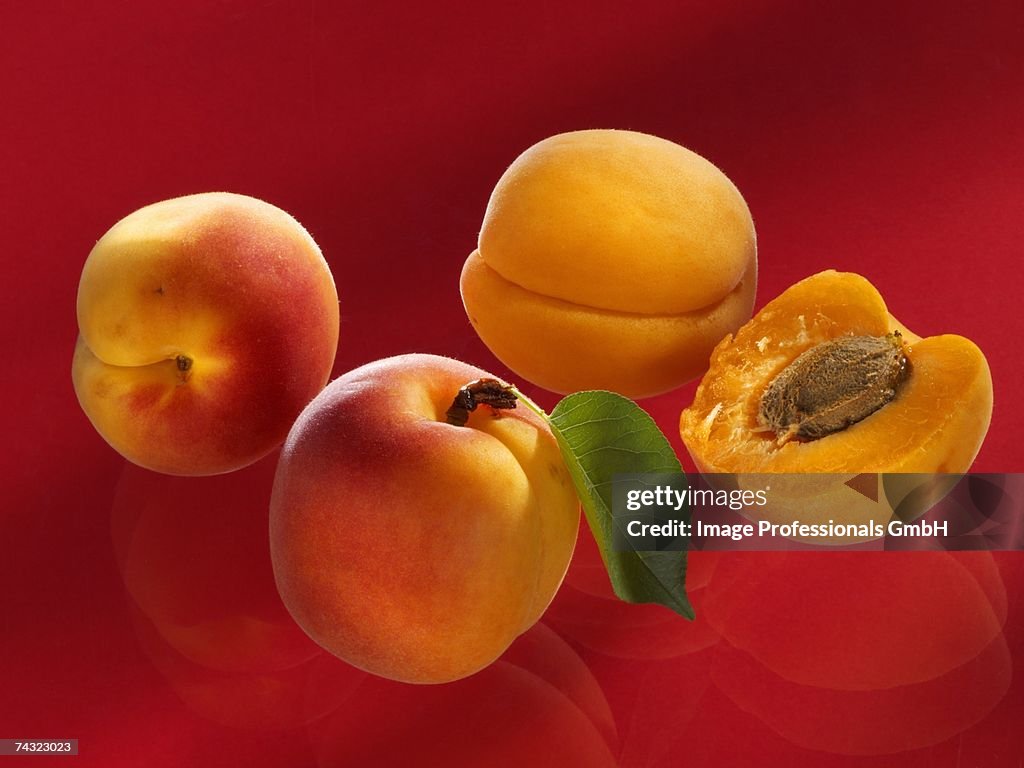 Three whole and one half apricot