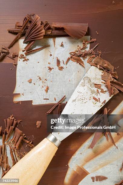 making chocolate curls - chocolate chunks top view stock pictures, royalty-free photos & images
