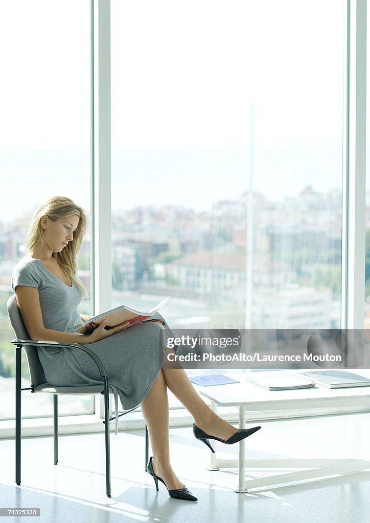 Woman sitting in waiting room