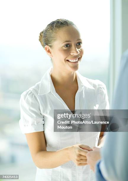 young female professional smiling - business woman blouse stock-fotos und bilder