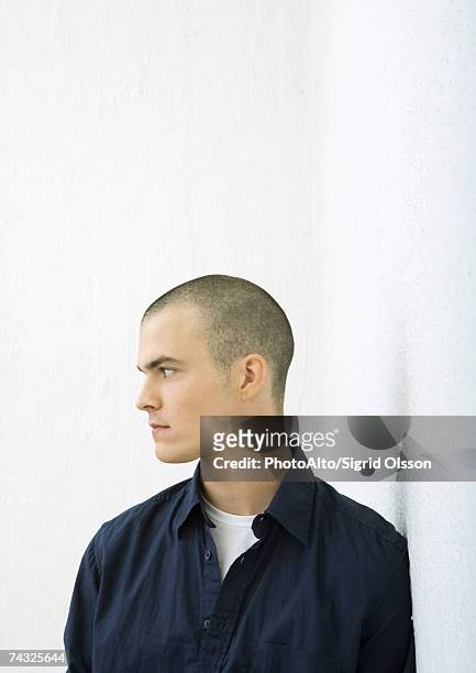 young man, profile, portrait - shaved head profile stock pictures, royalty-free photos & images