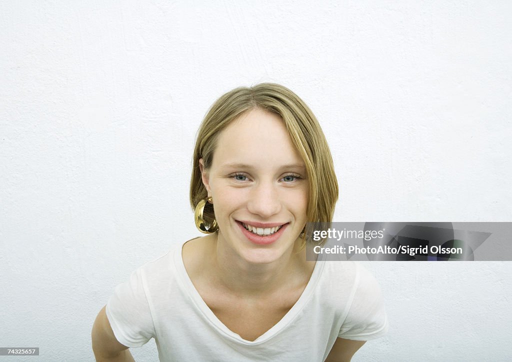 Teenage girl smiling at camera