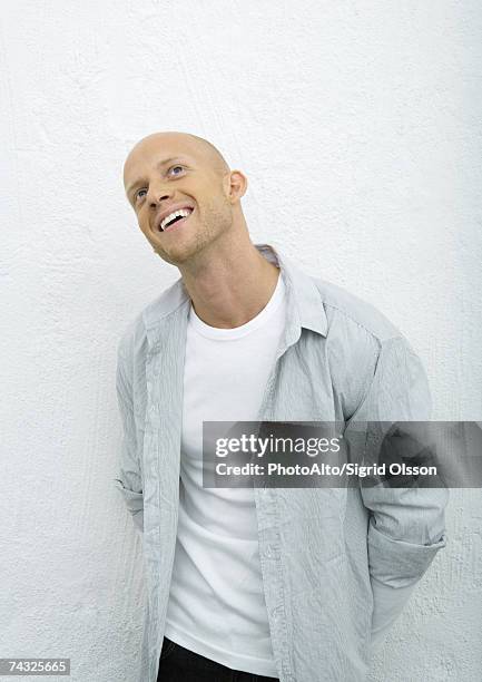 young man looking up, smiling, portrait - fashion man single casual shirt stock pictures, royalty-free photos & images