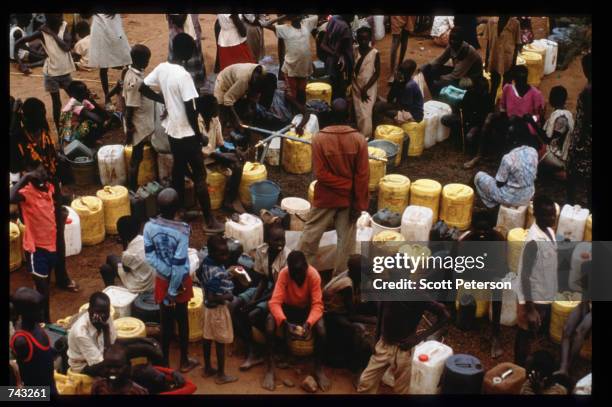 Young Sudanese boys live in a refugee camp June 18, 1992 in Kenya. Over 17,000 young boys between the age of six and seventeen left Sudan in 1987...