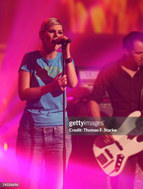 Singer Eva Briegel performs with pop group Juli during "The Dome 42" music show at the TUI Arena on May 25, 2007 in Hanover, Germany.
