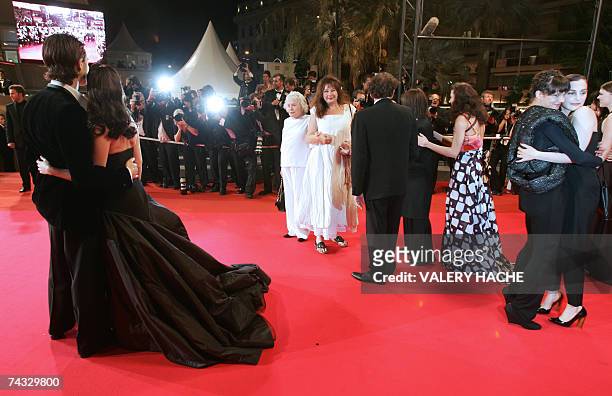 French actors Fu'ad Ait Aattou and Roxane Mesquida , Italian actress Asia Argento and French actress Amira Casar pose 25 May 2007 upon arriving with...
