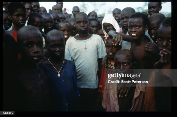 Young Sudanese boys live in a refugee camp June 18, 1992 in Kenya. Over 17,000 young boys between the age of six and seventeen left Sudan in 1987...