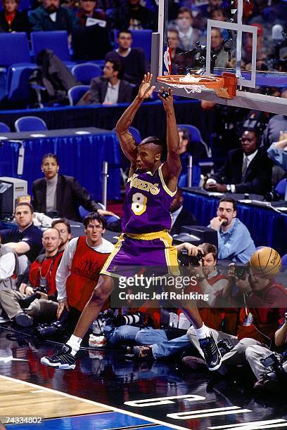 Kobe Bryant of the Western Conference finishes a dunk against the Western Conference during the 1997 Rookie Game played February 8, 1997 at the Gund...