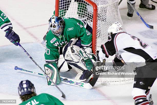 Michal Repik of the Vancouver Giants scores on Michal Neuvirth of the Plymouth Whalers during the Semifinal game of the 2007 Mastercard Memorial Cup...