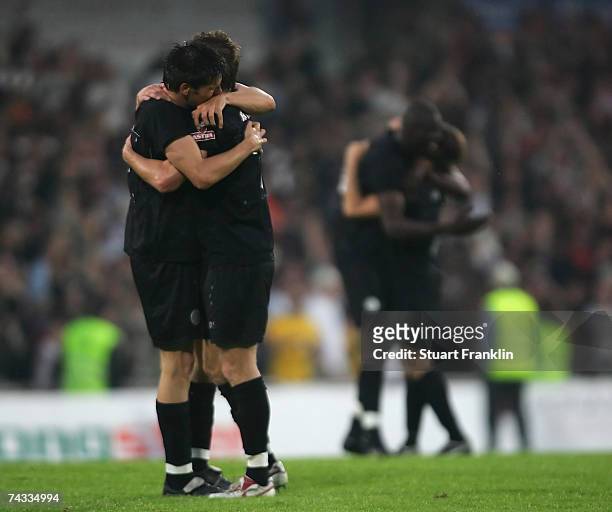Fabian Boll and Marvin Braun of St. Pauli celebrates promotion to the second league after the Third League Northern Division match between FC...