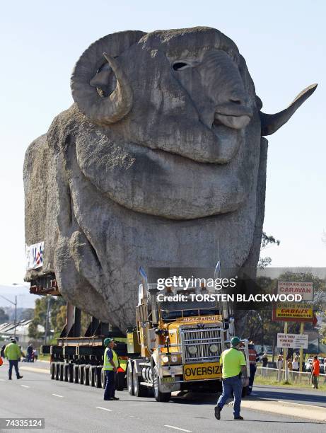 Riggers watch The Big Merino tourist attraction moving down the Hume Highway to its new location just south of Goulburn, 26 May 2007. It took nearly...