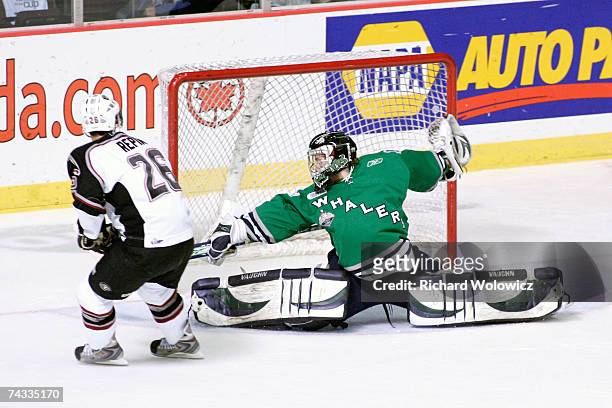 Michal Repik of the Vancouver Giants scores on Jeremy Smith of the Plymouth Whalers during the Semifinal game of the 2007 Mastercard Memorial Cup...