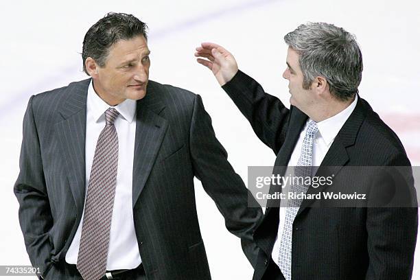 Plymouth Head Coach Michael Vellucci congratulates Vancouver Head Coach Don Hay after the Semifinal game of the 2007 Mastercard Memorial Cup...