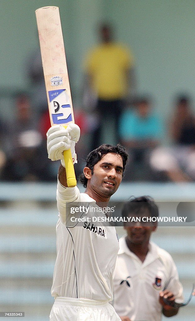 Dinesh Rai Indian cricketer Dinesh Karthik raises his bat after reaching a... News ...