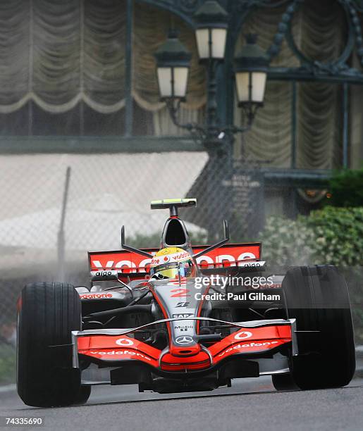 Lewis Hamilton of Great Britain and McLaren Mercedes drives through Casino Square in the warm up session prior to qualifying for the Monaco Formula...