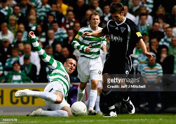 Mark Burchill of Dunfermline Athletic tackles Kenny Miller of Celtic during the Scottish Cup Final, between Dunfermline Athletic and Celtic at...