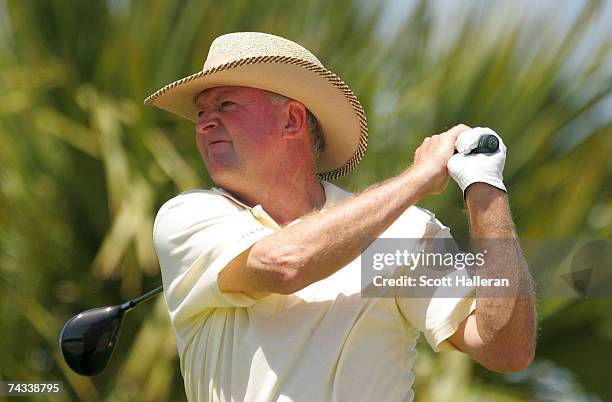 Denis Watson of Zimbabwe hits his tee shot on the seventh hole during the third round of the Senior PGA Championship on May 26, 2007 on the Ocean...