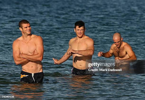 Matt King of the Storm still manages a smile in the cold water during the Melbourne Storm Recovery session at the St Kilda Sea Baths May 27, 2007 in...