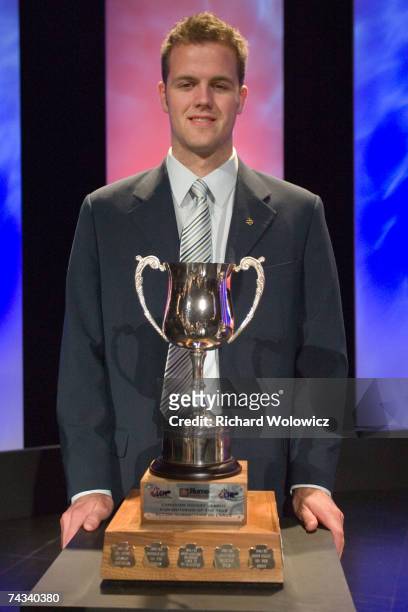 Kyle Moir of the Swift Current Broncos stands with the 2007 Home Hardware Humanitarian of the Year trophy after the 2007 CHL Awards Banquet at the...