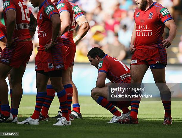 Jarrod Mullen of the Knights shows disappointment after another Broncos try during the round 11 NRL match between the Brisbane Broncos and the...