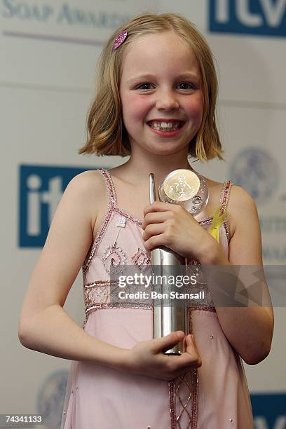 Actress Eden Taylor-Draper poses back stage with her young actor award at the British Soap Awards 2007 at the BBC Television Centre on May 26, 2007...