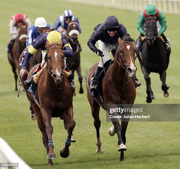 Johnny Murtagh and Notnowcato get the better of the Seamus Hefferman ridden Dylan Thomas to land The Tattersalls Gold Cup Race run at The Curragh...