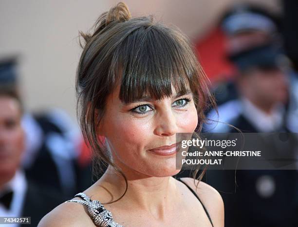 French actress Sophie Duez poses 27 May 2007 upon arriving at the Festival Palace in Cannes, southern France, to attend the Closing ceremony of the...