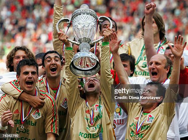 Moscow's Lokomotiv team celebrates their victory in the Russian Cup final match between Lokomotiv Moscow and FC Moskva at the Luzhniki Stadium, May...