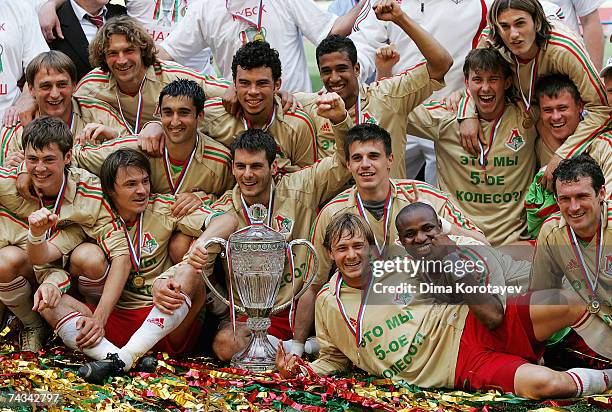 Moscow's Lokomotiv team celebrates their victory in the Russian Cup final match between Lokomotiv Moscow and FC Moskva at the Luzhniki Stadium, May...