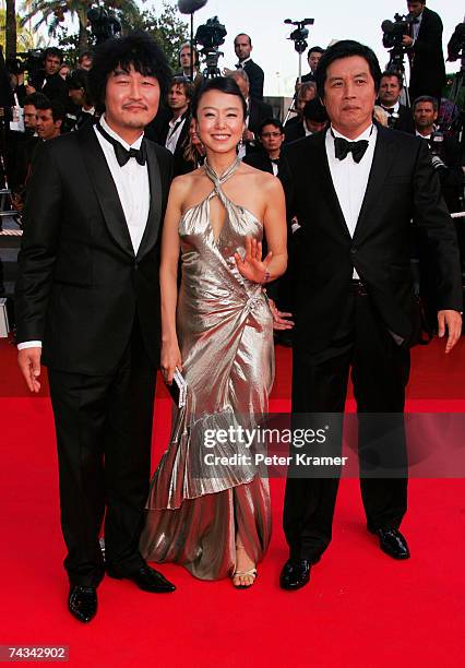 Actors Do-yeon Jeon, Kang-ho Song and director Chang-dong Lee attend the 60th International Cannes Film Festival closing ceremony and "L'Age des...