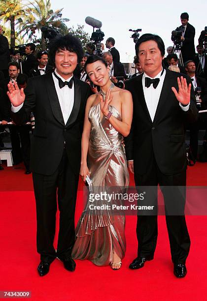 Actors Do-yeon Jeon, Kang-ho Song and director Chang-dong Lee attend the 60th International Cannes Film Festival closing ceremony and "L'Age des...