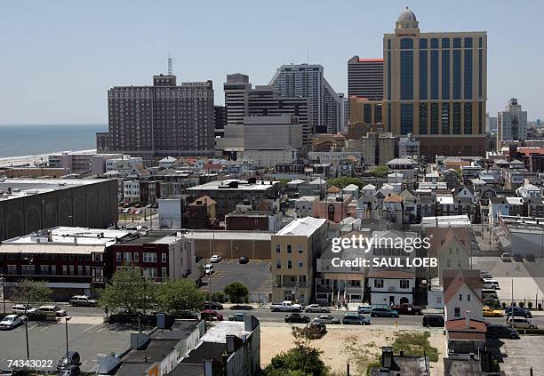 Atlantic City, UNITED STATES: The Tropicana Casino and Resort in Atlantic City in Atlantic City, New Jersey, is pictured 24 May 2007, next to...