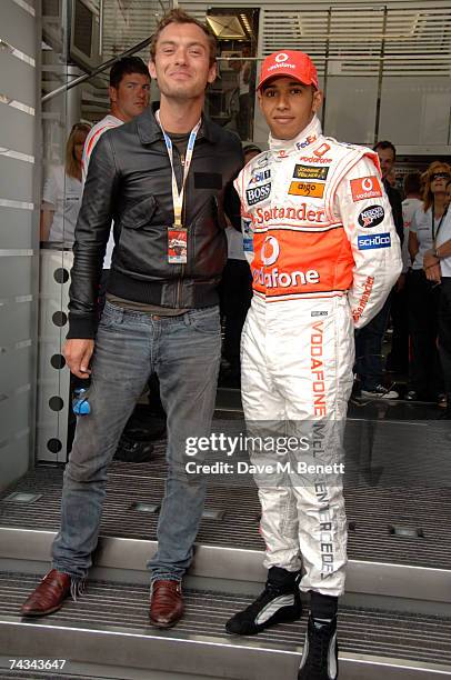 Actor Jude Law and Lewis Hamilton of Great Britain and McLaren Mercedes meet in the paddock before the Monaco Formula One Grand Prix at the Monte...