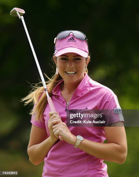 Paula Creamer smiles walking off the ninth green during the final round of the Corning Classic on May 27, 2007 at the Corning Country Club in...