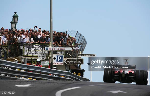 Crowds watch as the cars enter Casino Square during the Monaco Formula One Grand Prix at the Monte Carlo Circuit on May 27, 2007 in Monte Carlo,...